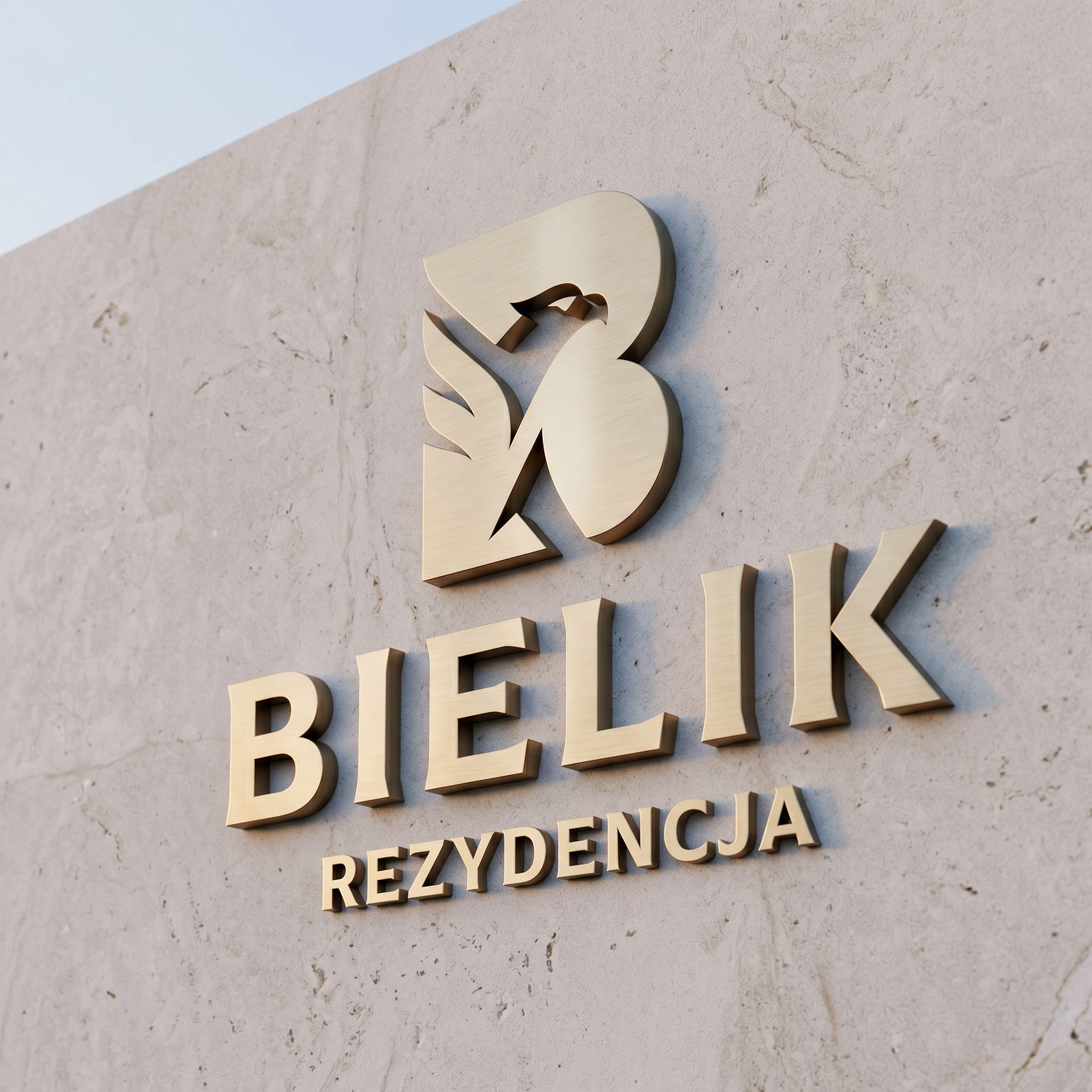 Monogram z bielikiem na jasnej elewacji