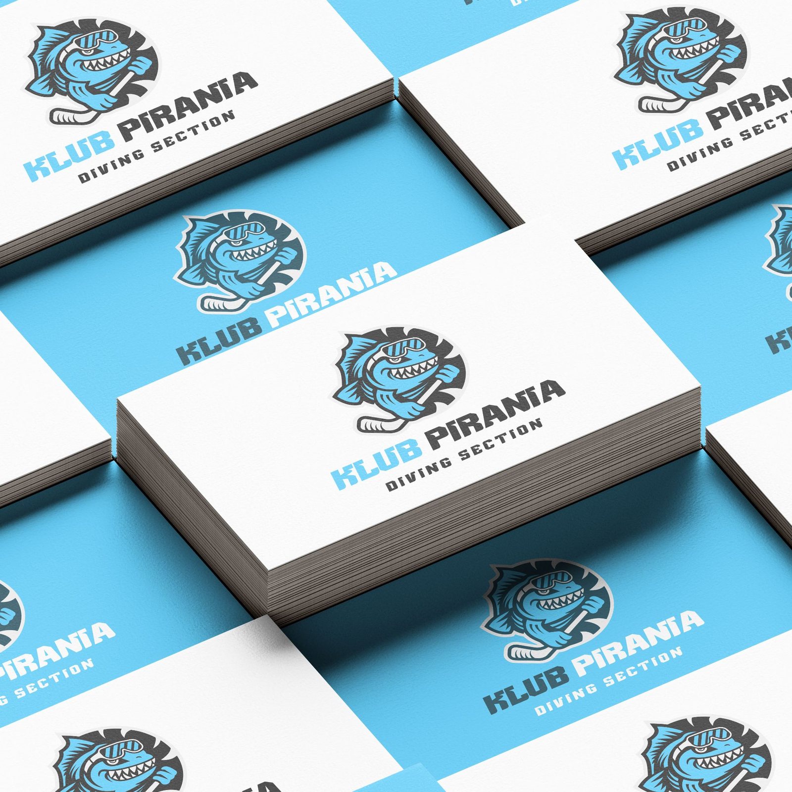 Mockup wizytówek Klubu Pirania z logo maskotki — projekt Skubi Art