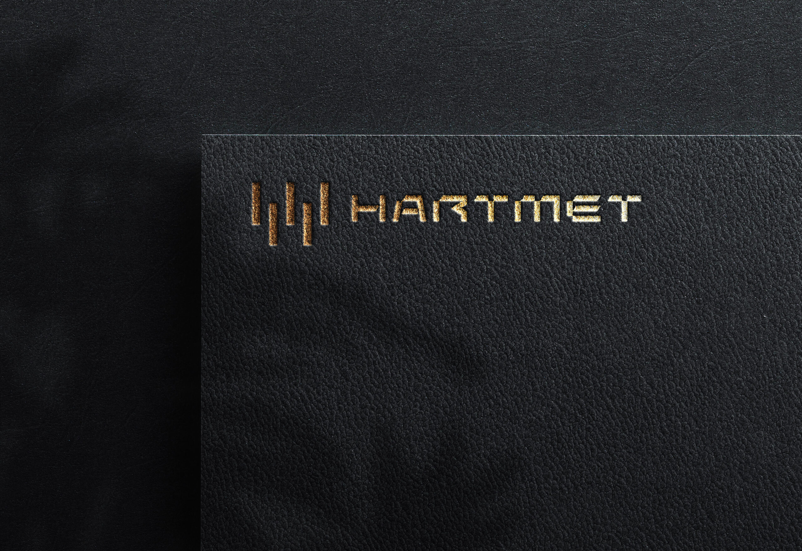 HART-MET — metaliczne logo z monogramem H i M, projekt Skubi Art