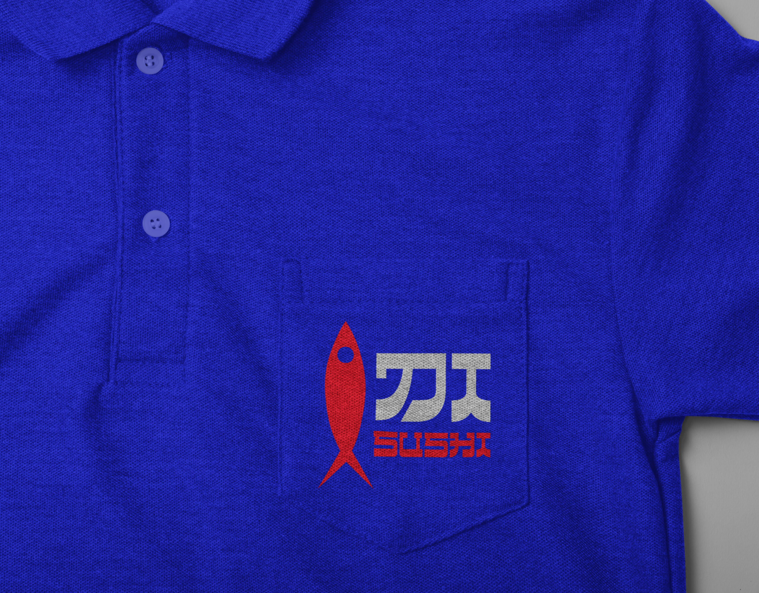 Logo DI SUSHI na koszulce pracownika restauracji